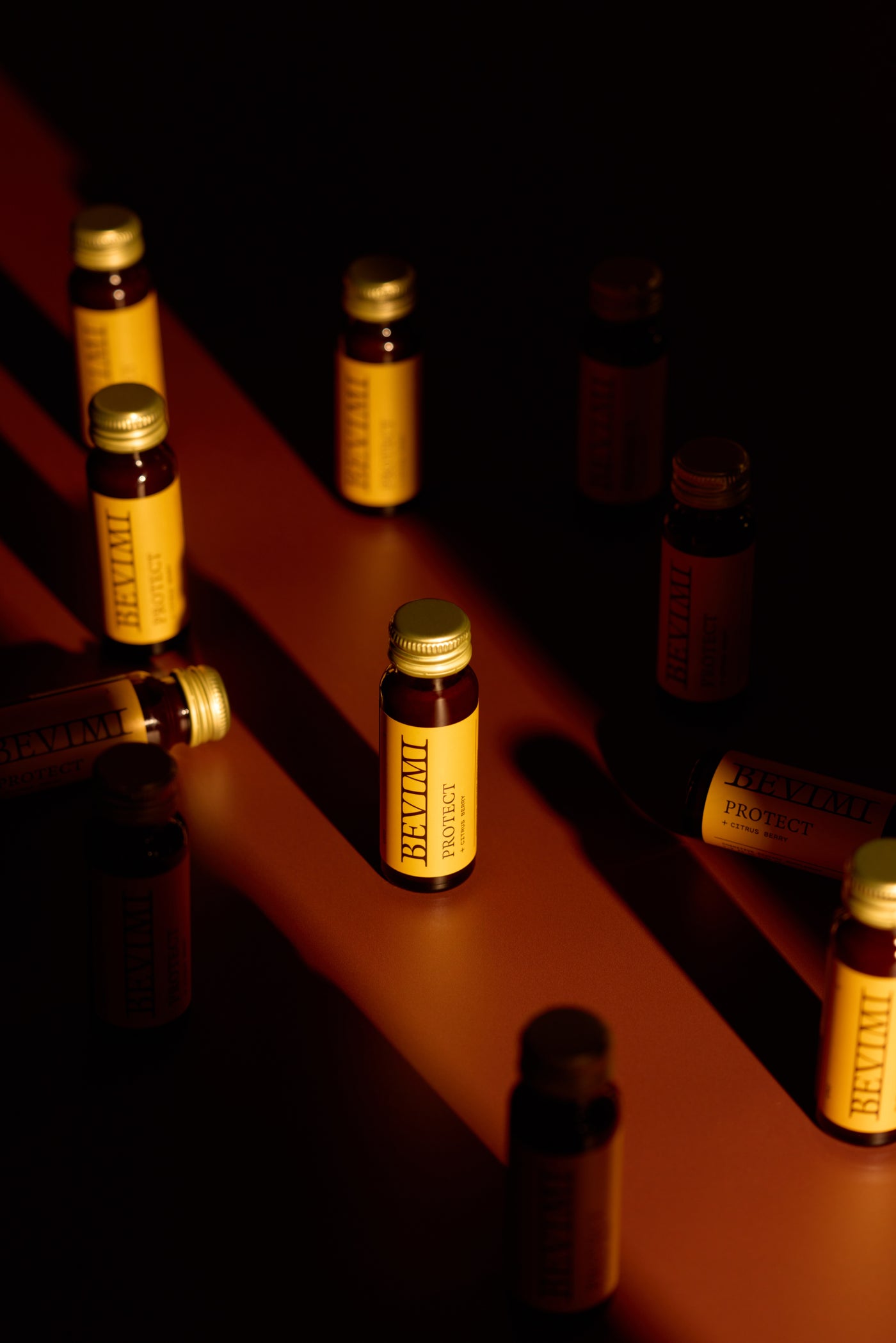 Bevimi Uno Protect bottles arranged on a dark surface